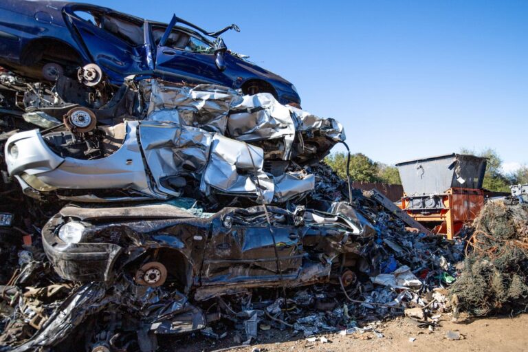 Decommissioned Vehicles at Scrap Yard are Shredded and Recycled